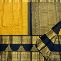 Mustard Yellow Silk Saree with Navy Blue Peacock Zari Pallu