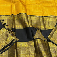 Mustard Yellow Silk Saree with Navy Blue Peacock Zari Pallu