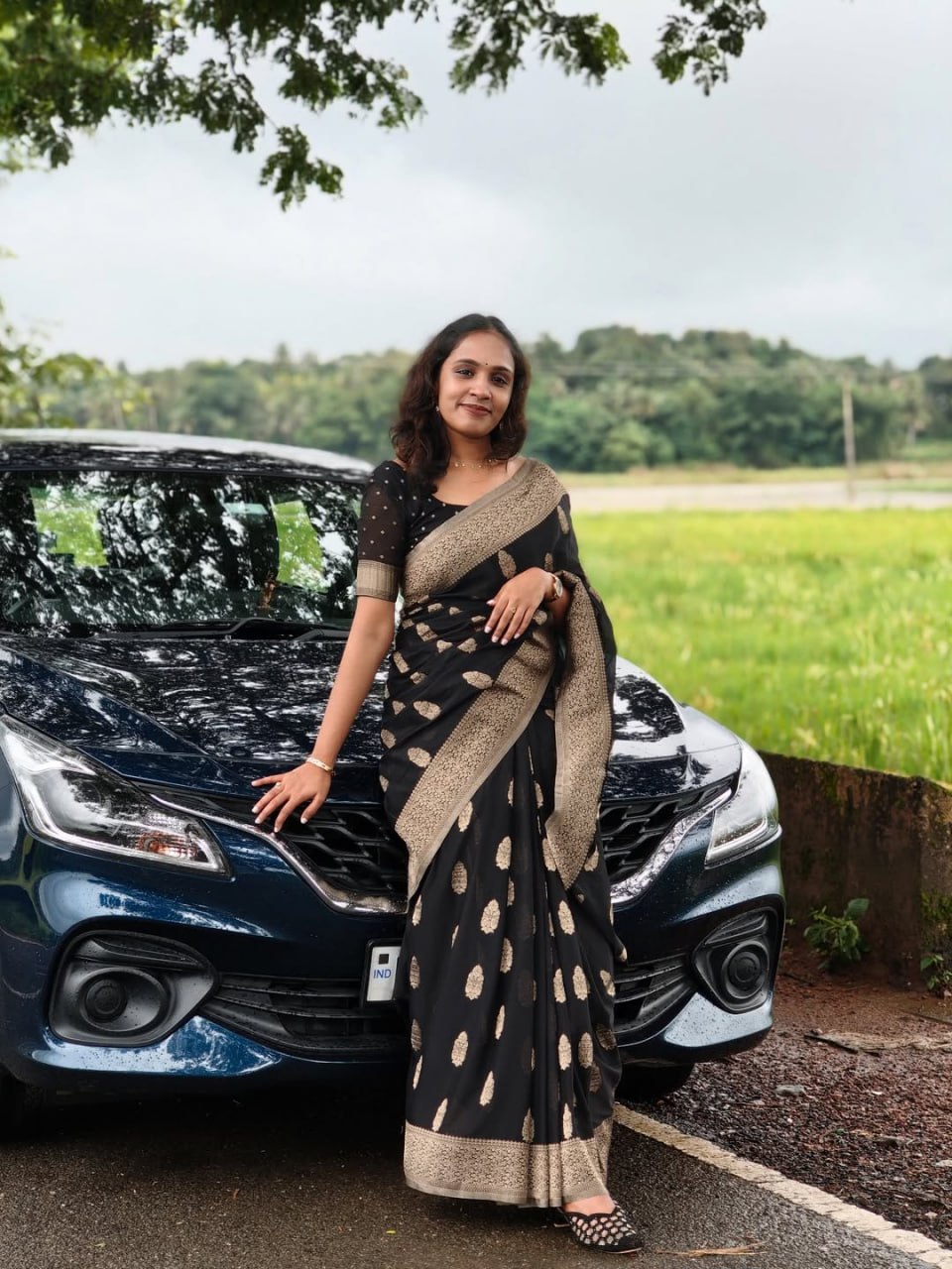 Black Silk Saree with Antique Gold Zari Motifs & Border