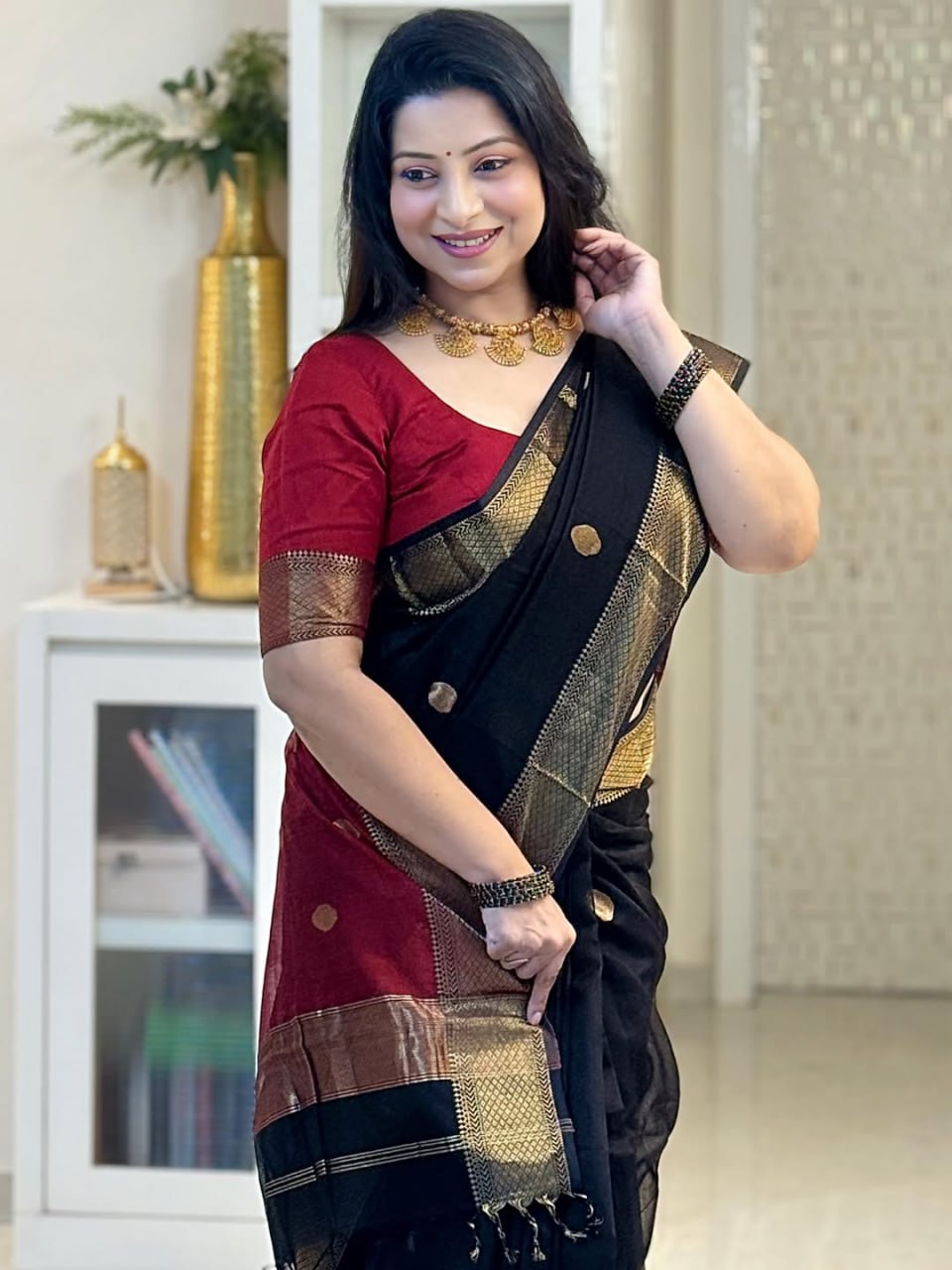 Elegant Black & Red Silk Saree with Gold Border