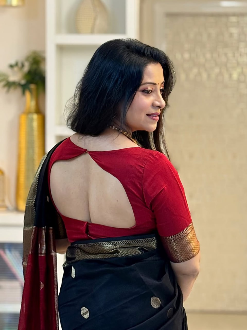 Elegant Black & Red Silk Saree with Gold Border