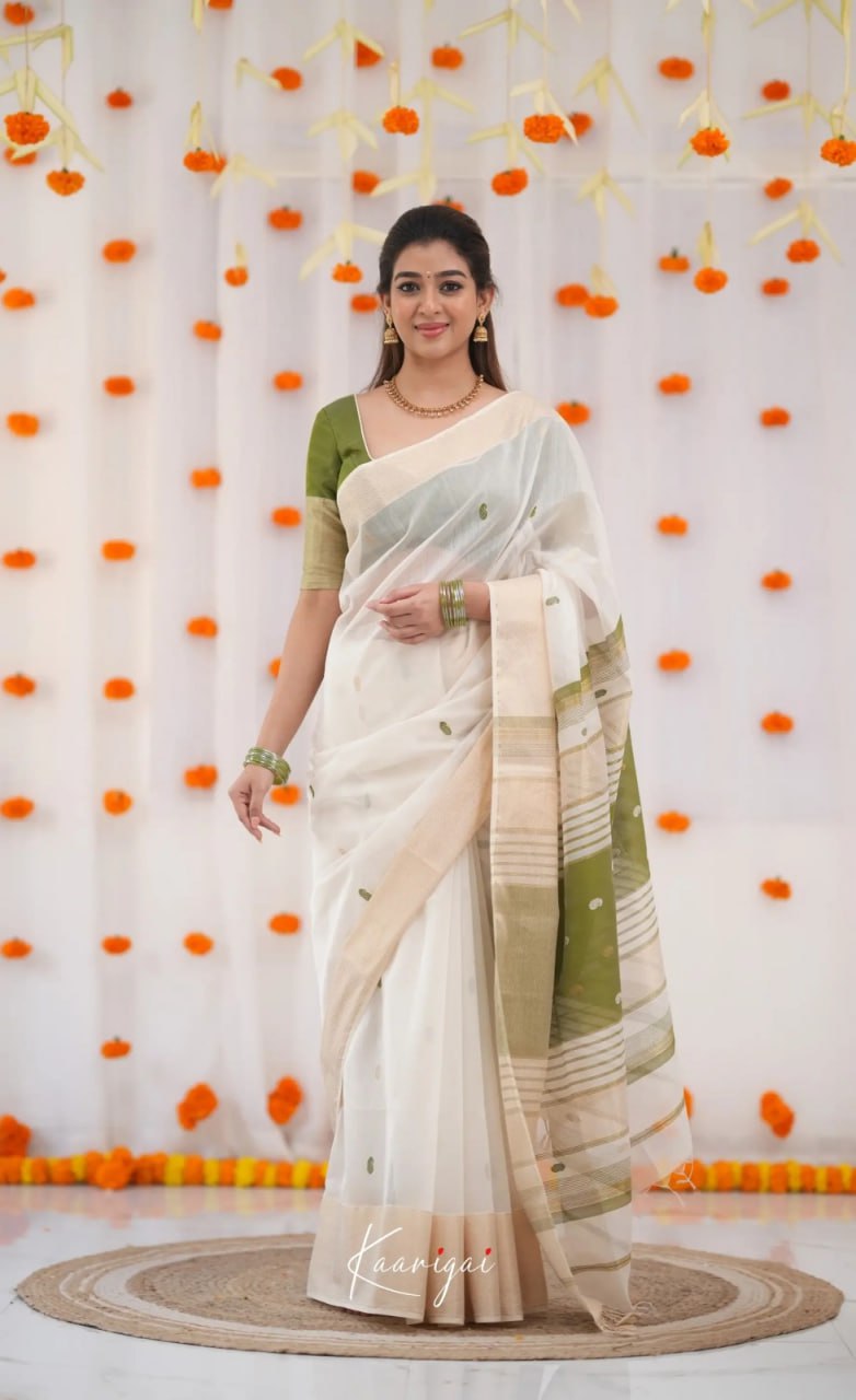 Elegant Ivory White Cotton Saree with Olive Green Border – Minimal Festive Look
