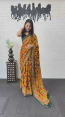 Mustard Yellow Cotton Saree with Tribal Inspired Print & Olive Green Border