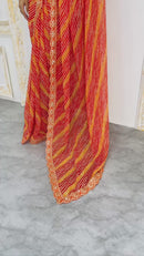 Lime Green Leheriya Print Saree with Elegant Lace Border