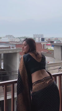 Elegant Black Georgette Saree with Antique Gold Floral Border & Butti Work