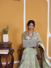 Pastel Pistachio Green Banarasi Silk Saree with Silver Zari Weaving