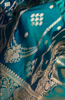 Teal Blue Banarasi Silk Saree with Gold Zari Floral Motifs and Rich Border